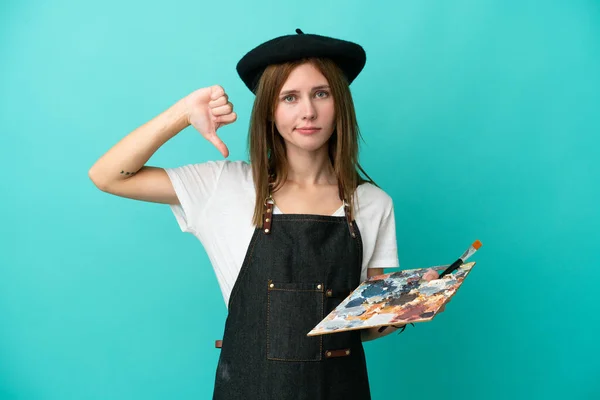 Jonge Artiest Engelse Vrouw Met Een Palet Geïsoleerd Blauwe Achtergrond — Stockfoto
