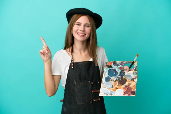 Young Artist English Woman Holding Palette Isolated Blue Background Showing — Stock Photo, Image