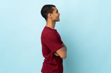 African American man over isolated background in lateral position