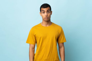 African American man over isolated background with sad expression