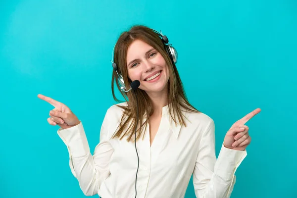 Telemarketer English Woman Working Headset Isolated Blue Background Pointing Finger — Stock Photo, Image