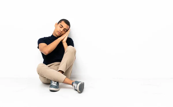 African American Man Sitting Floor Making Sleep Gesture Dorable Expression — Stock Fotó