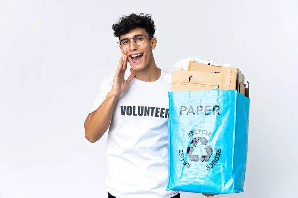 Young Man Holding Recycling Bag Full Paper Shouting Mouth Wide — Foto de Stock