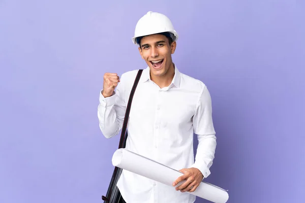 Young Architect Man Isolated Background Celebrating Victory Winner Position — Stockfoto