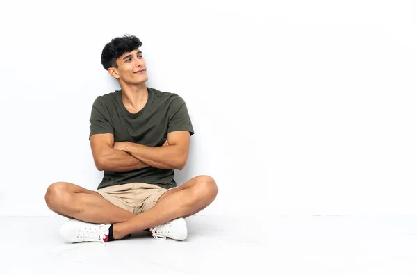 Young Argentinian Man Sitting Floor Lateral Position — Stock Fotó