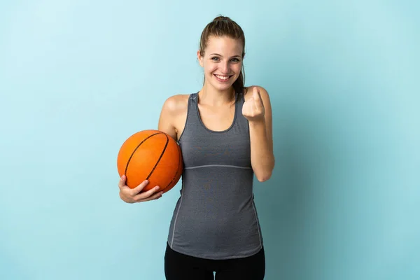 Young Woman Playing Basketball Isolated Blue Background Making Money Gesture — Stock Photo, Image