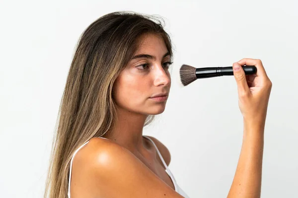 Young Caucasian Woman Isolated White Background Holding Makeup Brush — Stock Photo, Image