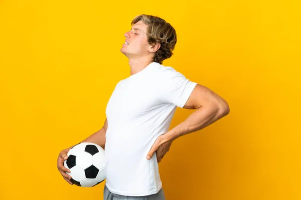 English Football Player Isolated Yellow Background Suffering Backache Having Made — Φωτογραφία Αρχείου