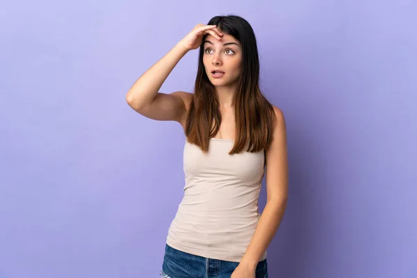 Young Caucasian Woman Isolated Purple Background Doing Surprise Gesture While — стоковое фото