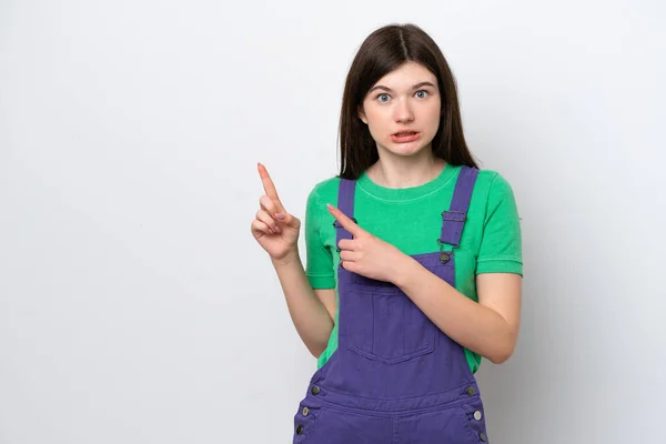 Young Russian Woman Isolated Blue Background Frightened Pointing Side — ストック写真