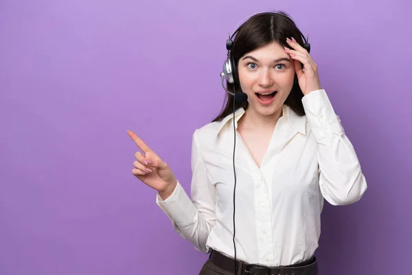 Telemarketer Russian Woman Working Headset Isolated Purple Background Surprised Pointing — Stockfoto