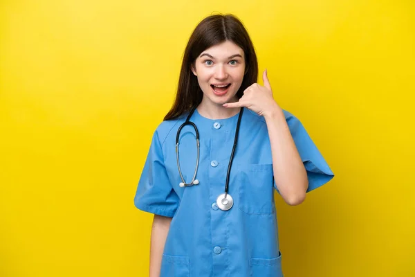 Young Surgeon Doctor Russian Woman Isolated Yellow Background Making Phone — стокове фото