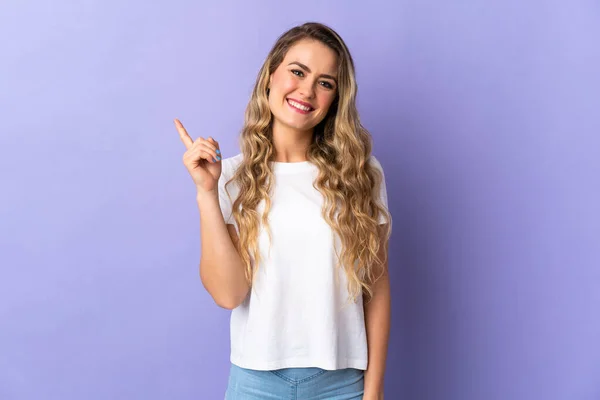 Young Brazilian Woman Isolated Purple Background Showing Lifting Finger Sign — Φωτογραφία Αρχείου