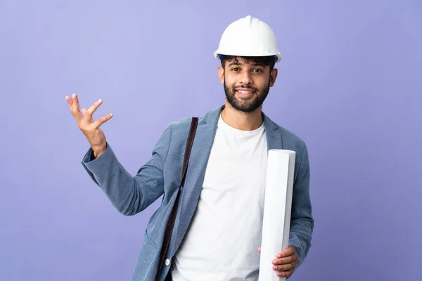 Young Architect Moroccan Man Helmet Holding Blueprints Isolated Background Extending — ストック写真