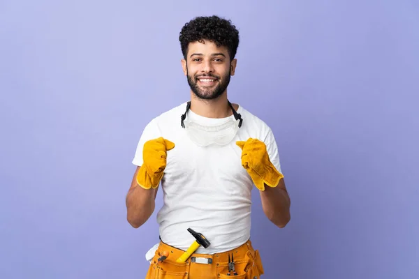 Young Electrician Moroccan Man Isolated Purple Background Celebrating Victory Winner — Stock Fotó