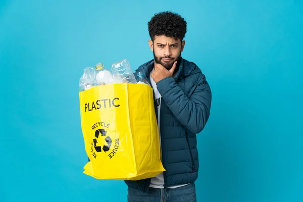 Young Moroccan Man Holding Bag Full Plastic Bottles Recycle Isolated — стокове фото