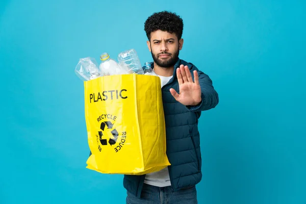 Young Moroccan Man Holding Bag Full Plastic Bottles Recycle Isolated — Stock Photo, Image