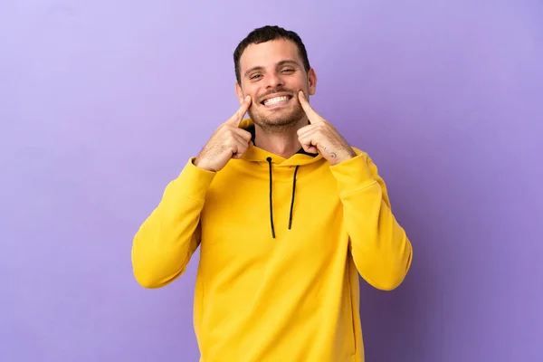 Brazilian Man Isolated Purple Background Smiling Happy Pleasant Expression — Stockfoto