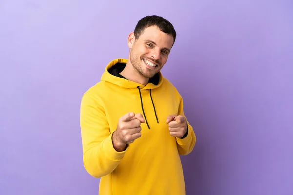 Brazilian Man Isolated Purple Background Pointing Front Smiling — 스톡 사진