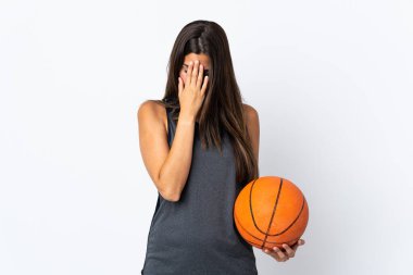Young brazilian woman playing basketball isolated on white background with tired and sick expression