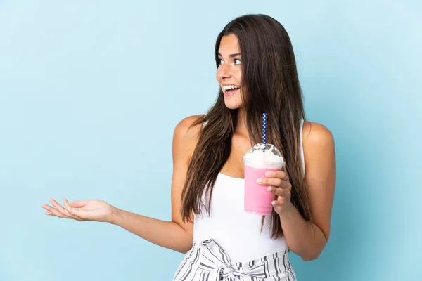 Young Brazilian Woman Strawberry Milkshake Isolated Blue Background Surprise Expression —  Fotos de Stock