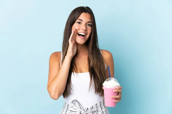 Young Brazilian Woman Strawberry Milkshake Isolated Blue Background Shouting Mouth — Stockfoto