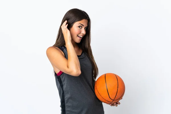 Young Brazilian Woman Playing Basketball Isolated White Background Listening Something — Φωτογραφία Αρχείου