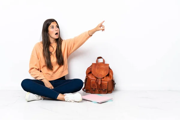 Young Student Brazilian Woman Sitting Floor Pointing Away — Foto Stock