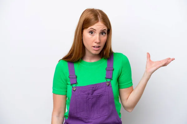 Young Redhead Woman Isolated White Background Making Doubts Gesture — Stock fotografie