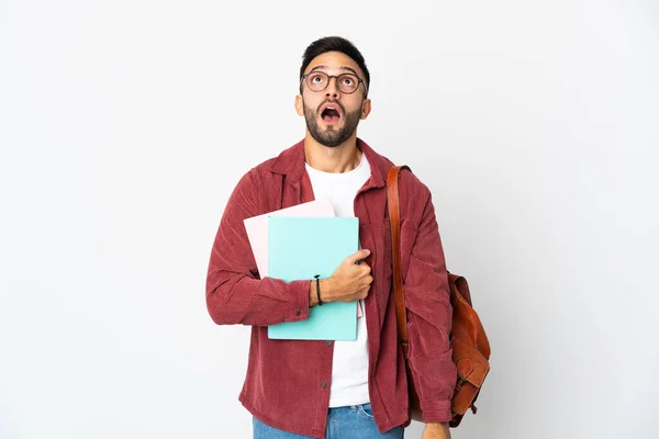 Joven Estudiante Aislado Sobre Fondo Blanco Mirando Hacia Arriba Con — Foto de Stock