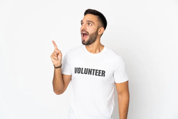 Young Caucasian Volunteer Man Isolated White Background Thinking Idea Pointing — Stock Photo, Image