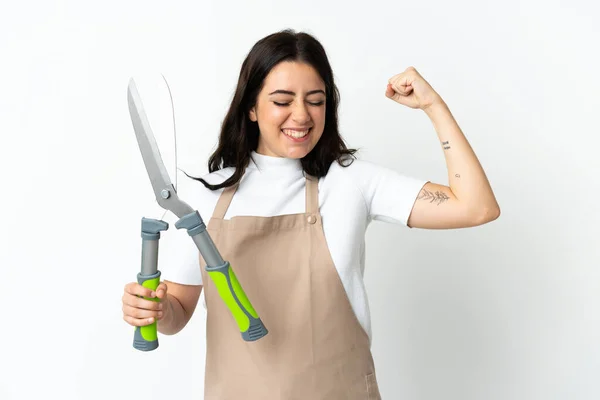 Mujer Joven Caucásica Sosteniendo Una Planta Aislada Sobre Fondo Blanco — Foto de Stock