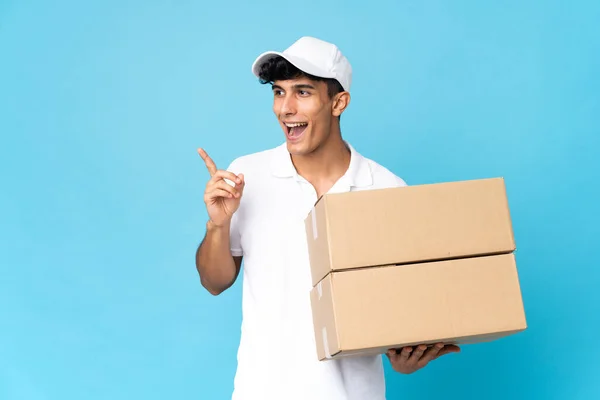 Delivery Argentinian Man Isolated Blue Background Intending Realizes Solution While — Stock Photo, Image