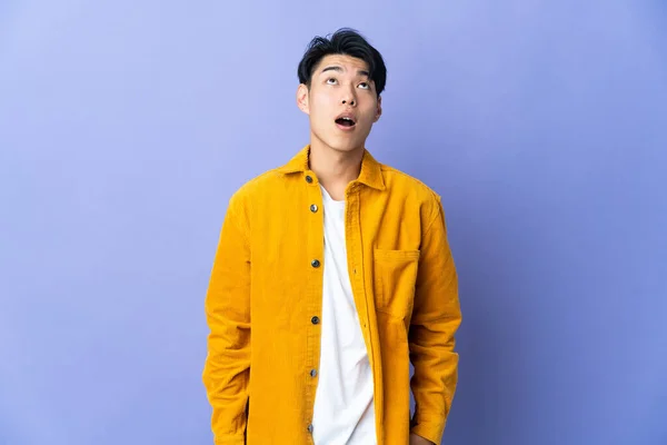 Young Chinese Man Isolated Purple Background Looking Surprised Expression — Stock Photo, Image