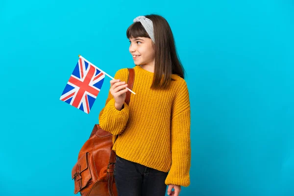 Malá Dívka Studuje Angličtinu Izolované Modrém Pozadí Hledá Straně — Stock fotografie