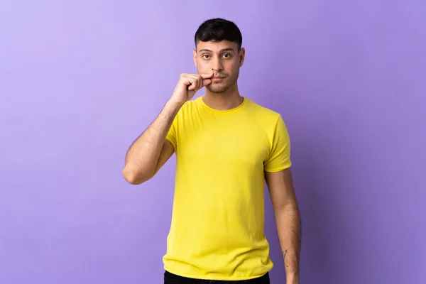 Young Colombian Man Isolated Purple Background Showing Sign Silence Gesture — Stock Photo, Image