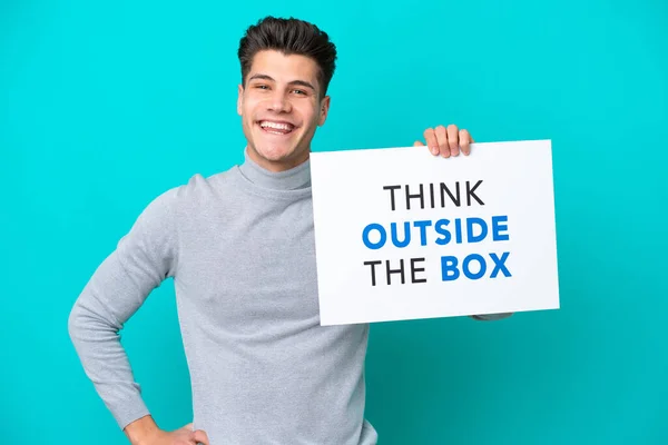 Young Handsome Caucasian Man Isolated Blue Bakcground Holding Placard Text — Stock Photo, Image