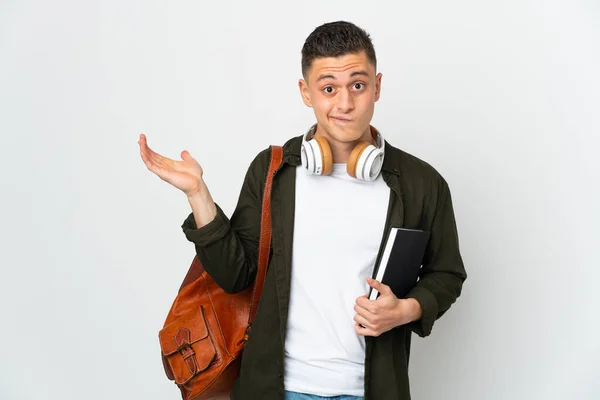 Joven Estudiante Caucásico Aislado Sobre Fondo Blanco Teniendo Dudas Mientras — Foto de Stock