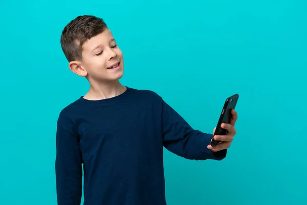 Little Kid Boy Isolated Blue Background Making Selfie — Stock Photo, Image