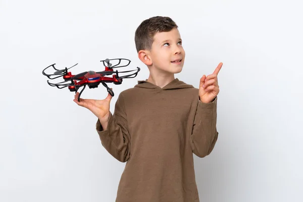 Little Caucasian Boy Holding Drone Isolated White Background Pointing Great — Stock Photo, Image