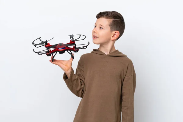 Little Caucasian Boy Holding Drone Isolated White Background Looking Side — Stock Photo, Image