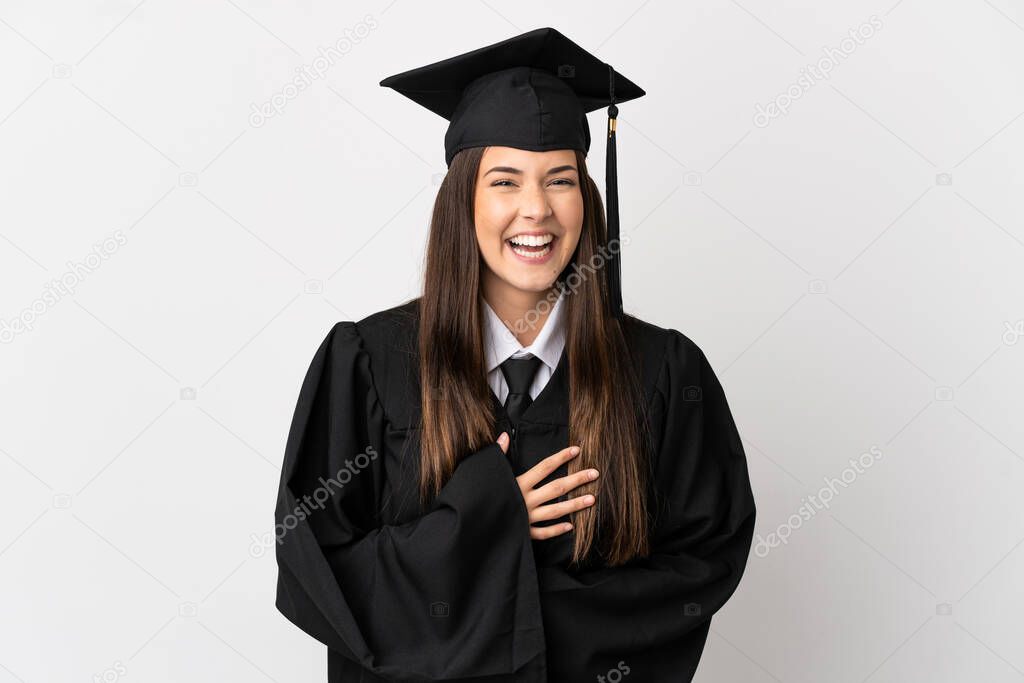 Teenager Brazilian university graduate over isolated white background smiling a lot