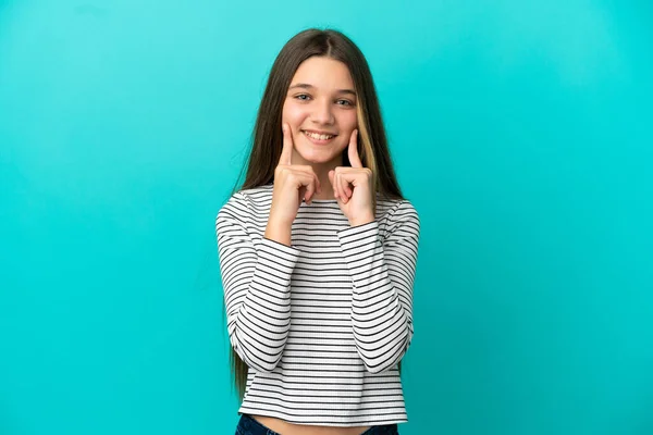 Dívka Přes Izolované Modré Pozadí Usmívá Veselým Příjemným Výrazem — Stock fotografie
