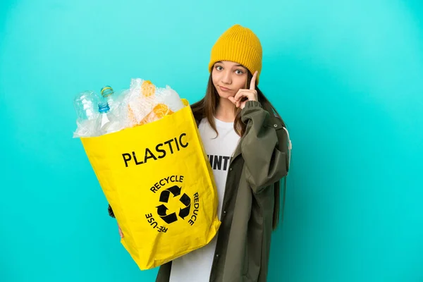Little Girl Holding Bag Full Plastic Bottles Recycle Isolated Blue — Stock Photo, Image