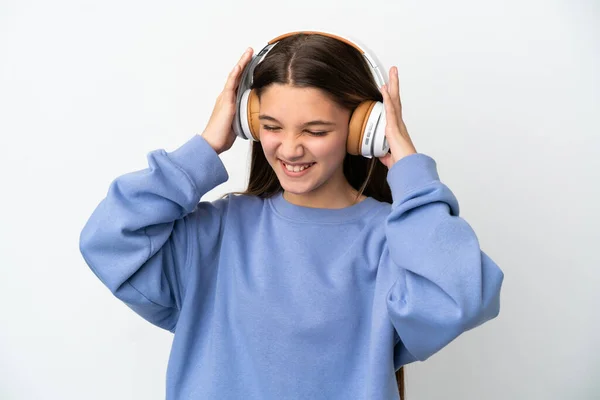 Маленькая Девочка Изолированном Белом Фоне Слушает Музыку — стоковое фото