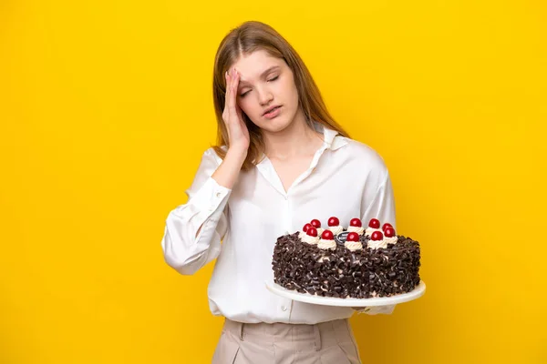 Teenager Russian Girl Holding Birthday Cake Isolated Yellow Background Headache — Stock Photo, Image