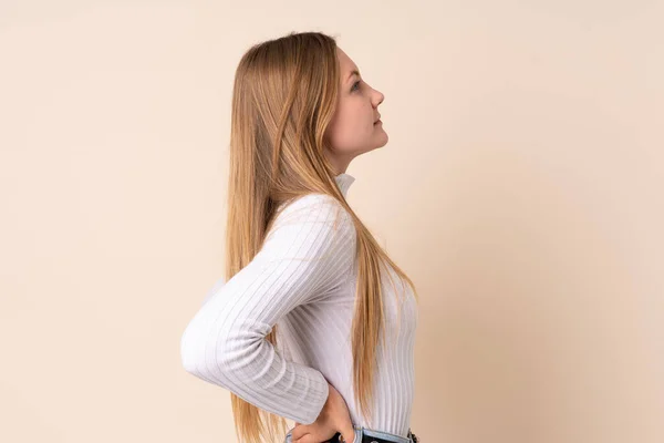 Teenager Ukrainian Girl Isolated Beige Background Suffering Backache Having Made — Stock Photo, Image
