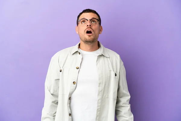 Brazilian Man Isolated Purple Background Looking Surprised Expression — Stock Photo, Image