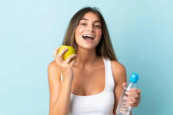 Mulher Branca Jovem Isolado Fundo Azul Com Uma Maçã Com — Fotografia de Stock