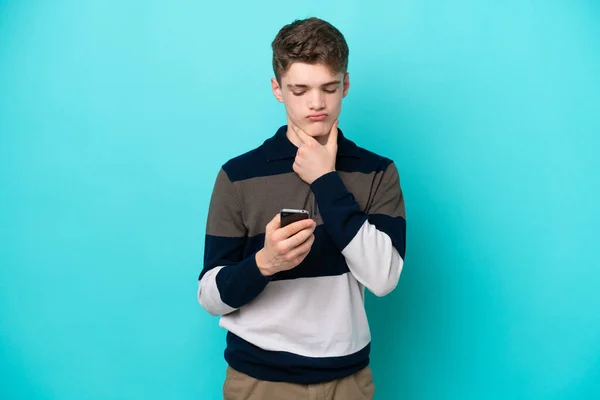 Teenager Russian Man Isolated Blue Background Thinking Sending Message — Stock Photo, Image